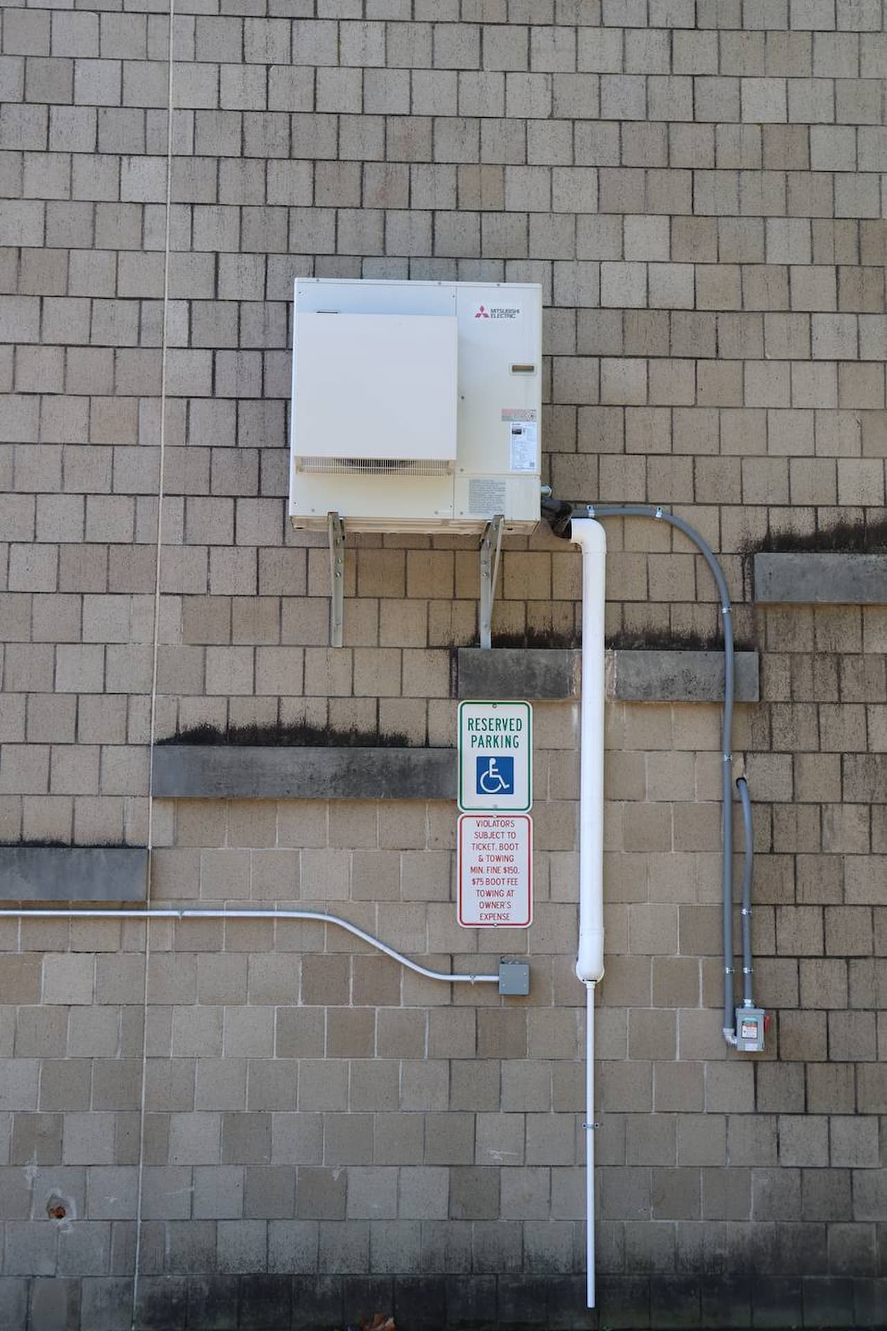 Commercial HVAC disconnect panel and conduit
