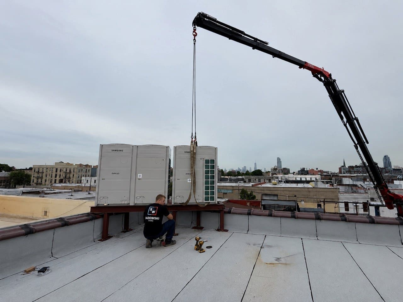 Commercial rooftop HVAC equipment crane placement