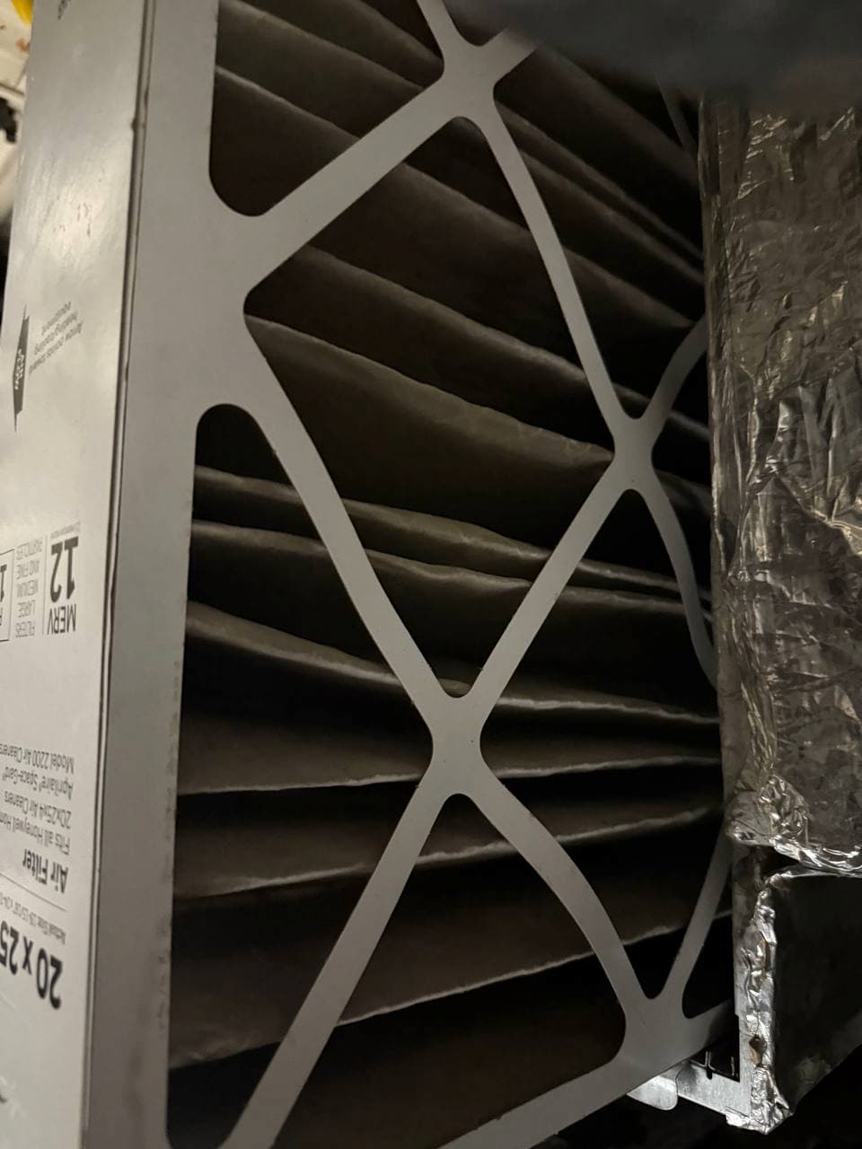Dirty commercial HVAC air filter closeup