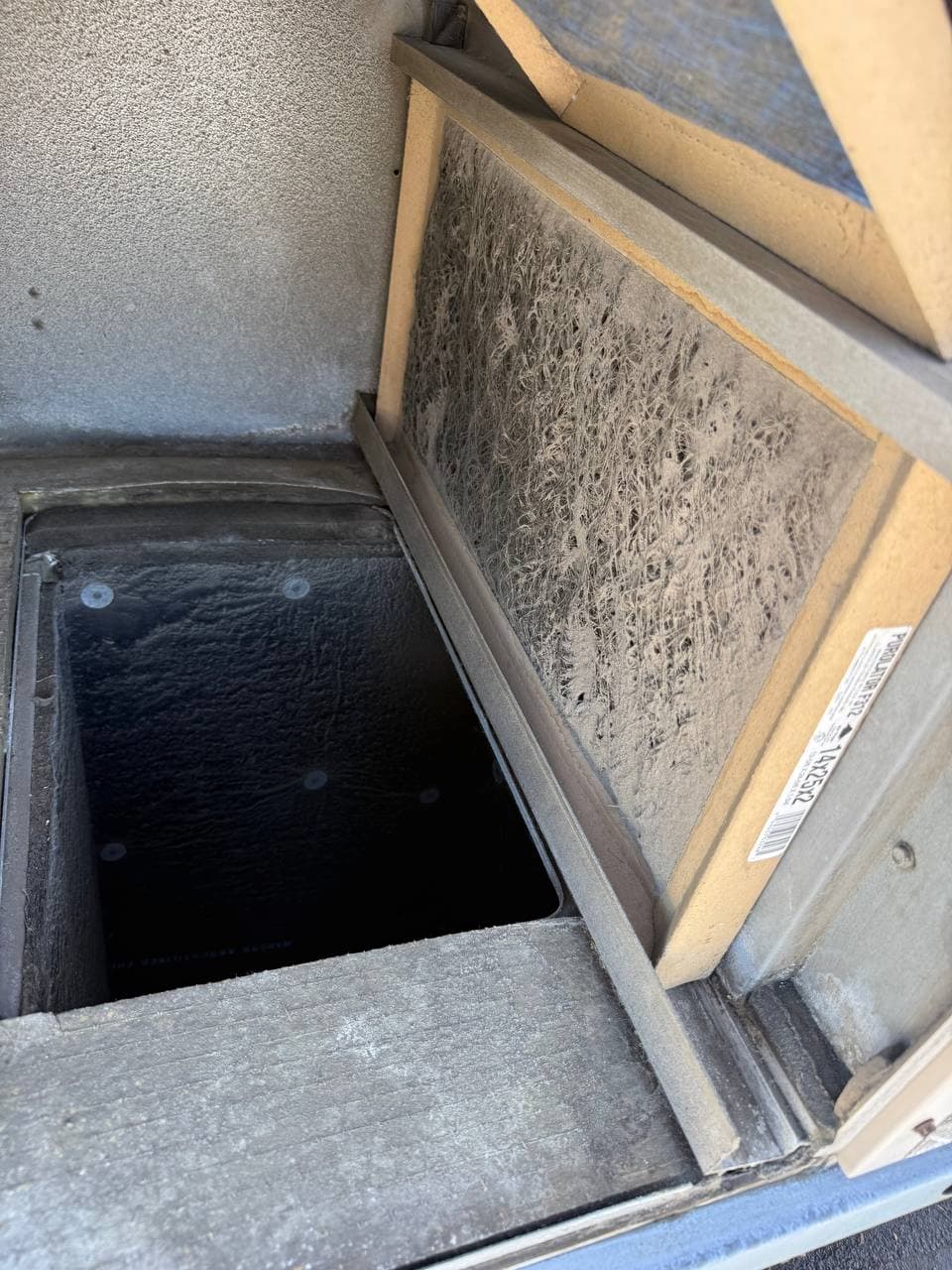 Dirty filter inside commercial HVAC unit