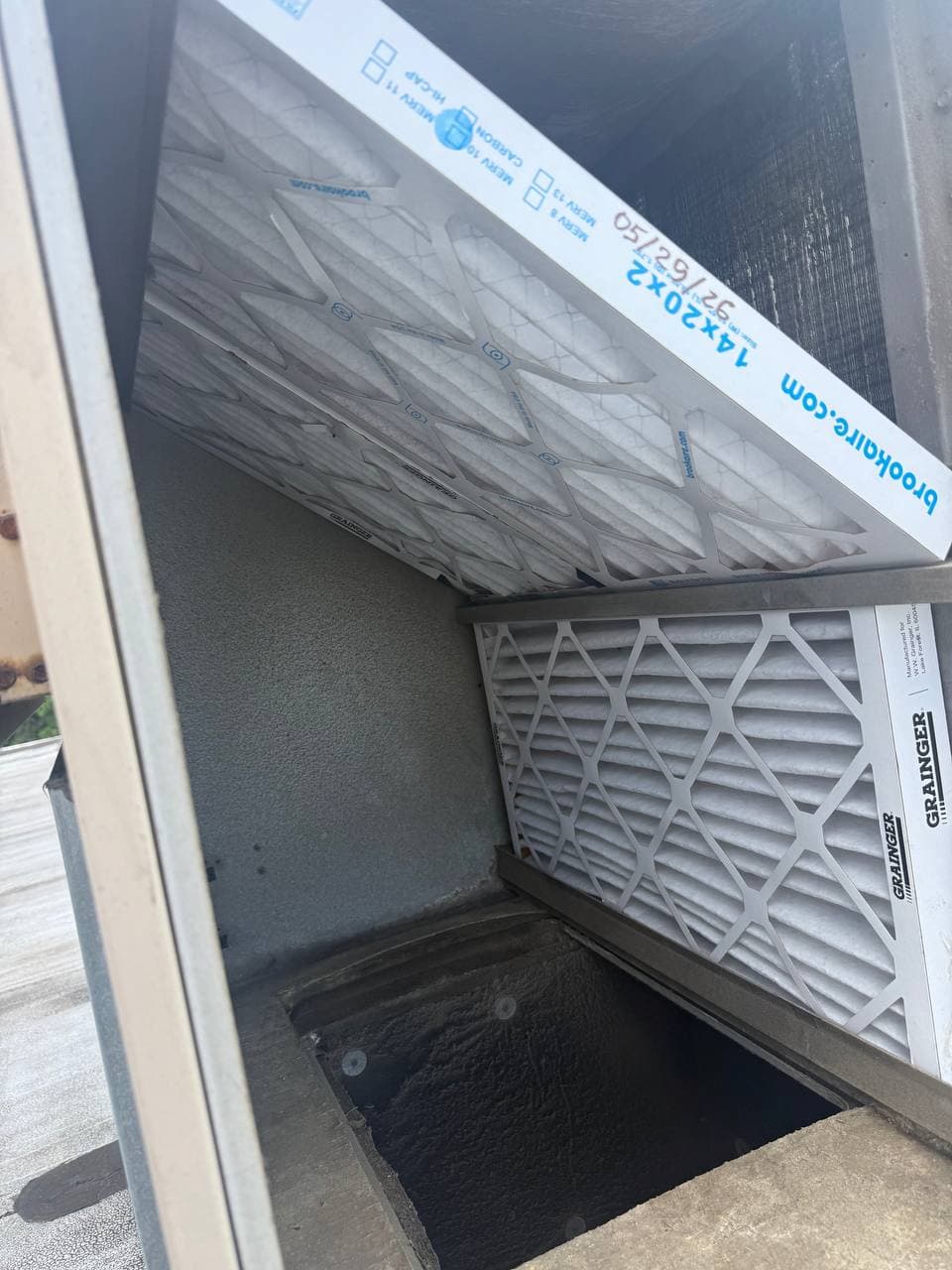 Commercial HVAC filter replacement access inside rooftop unit