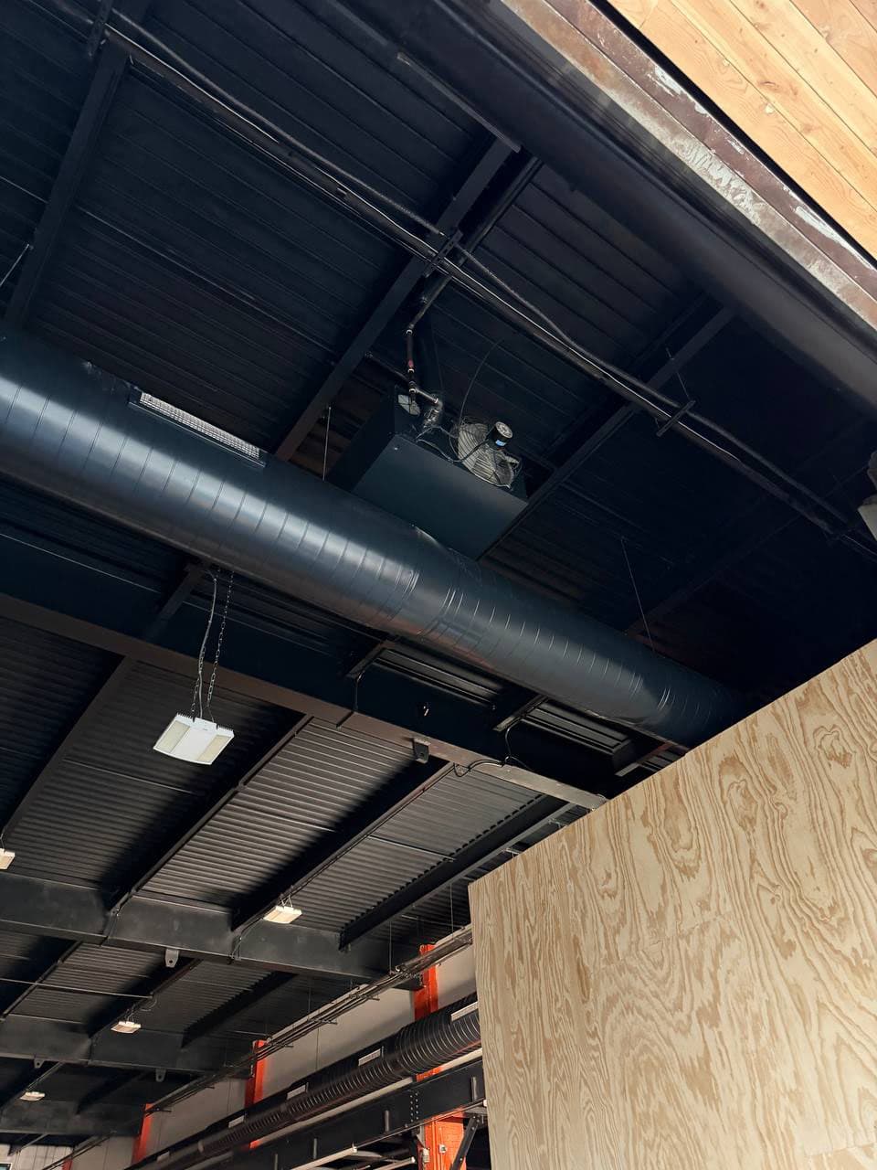 Hoops Klub black spiral ductwork installation
