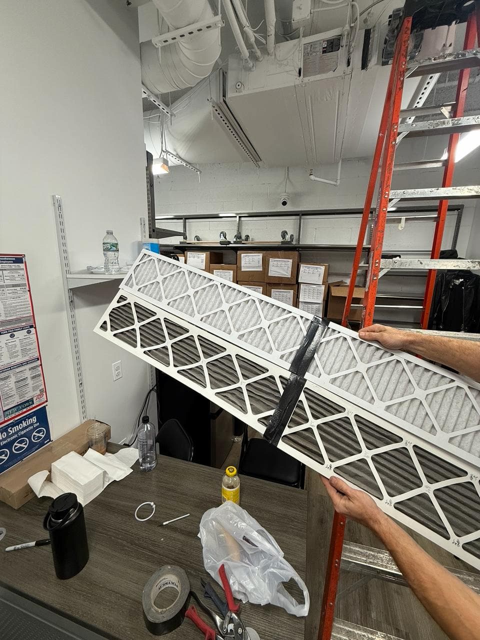 Commercial HVAC air filters removed for inspection and replacement