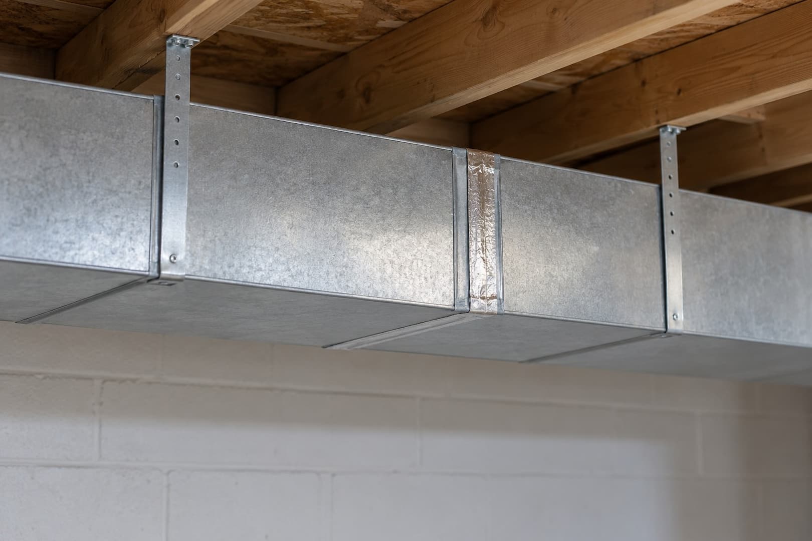Metal heating ducts in a residential basement