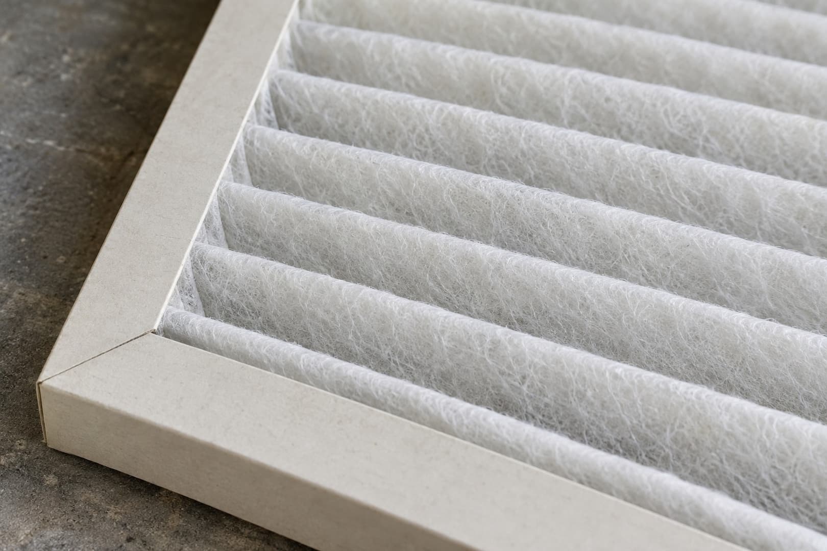 Close view of pleated air-filter material and its cardboard frame